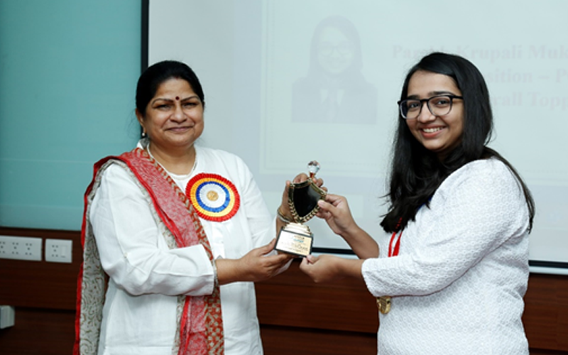  Trophy to PGDM Topper, Krupali Parekh by Director