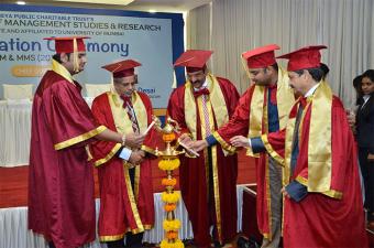  The Dignitaries, AIMSR - Trustees and Director, lighting the auspicious lamp at the Convocation Ceremony of MMS and PGDM Batch of 2015 â€“ 17